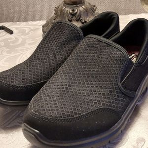 Ladie's Skechers Relax & Wide Fit Black Slip On Memory Foam Shoes.